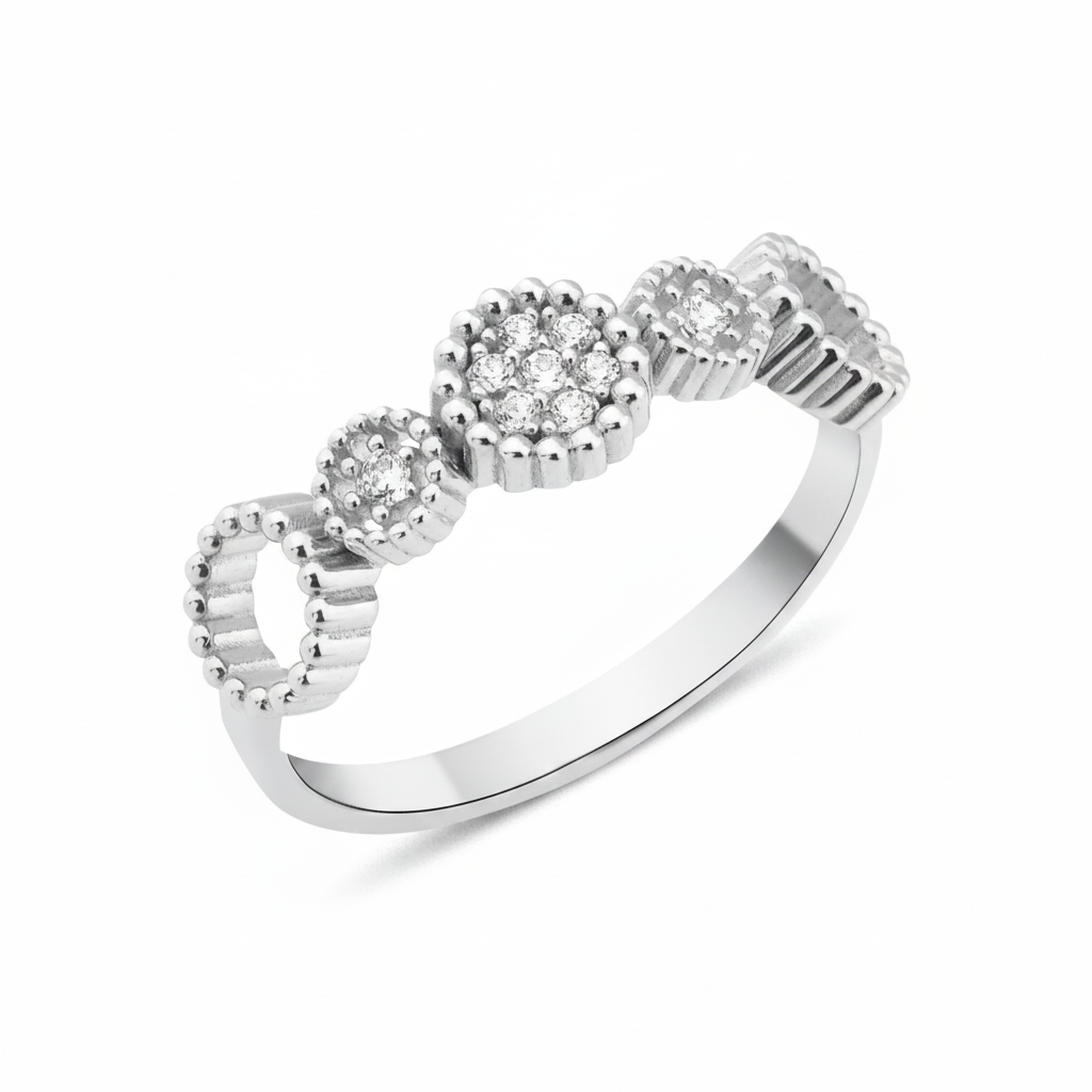 white gold floral cluster ring on white background