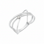white gold crossing paths ring on white background