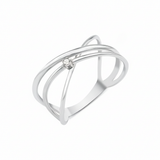 white gold crossing paths ring on white background
