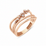 rose gold fluid trail ring on white background