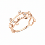 rose gold vine leaf ring on white background
