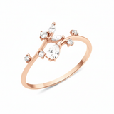 rose gold dew stem ring on white background