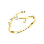 yellow gold twig branch ring on white background