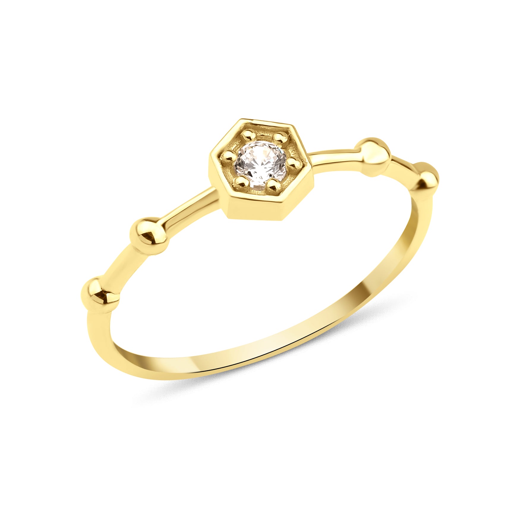 yellow gold hexagon bead ring on white background
