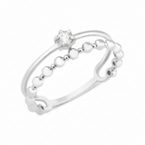 white gold smooth beaded ring on white background