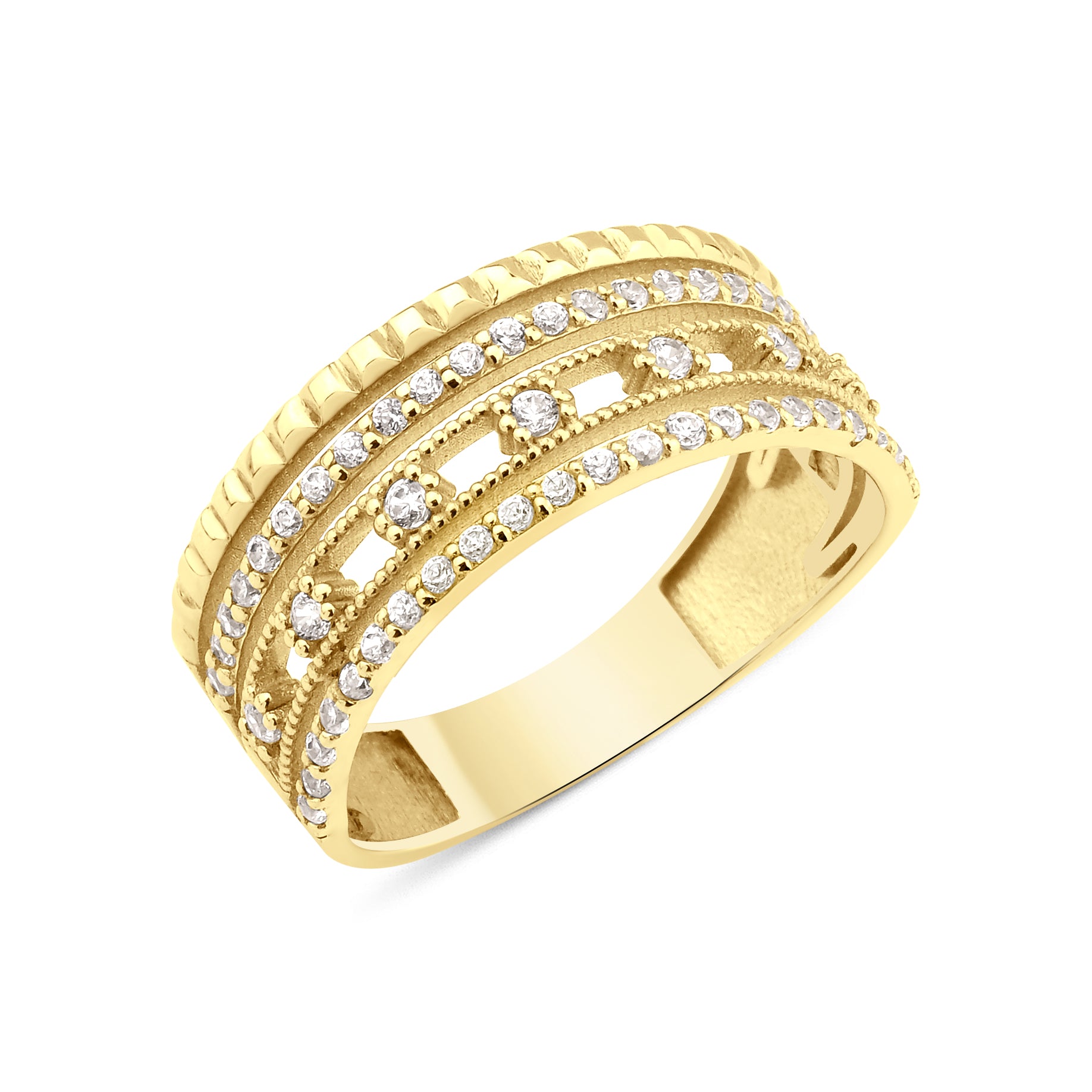 yellow gold ribbed statement ring on white background