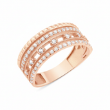 rose gold ribbed statement ring on white background