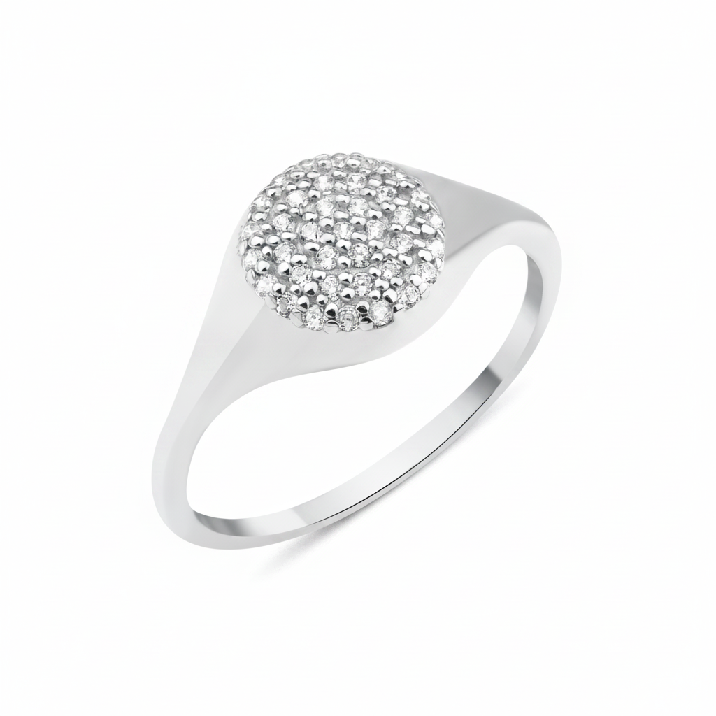 white gold signet crest ring on white background