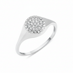 white gold signet crest ring on white background