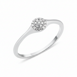 white gold domed pave ring on white background