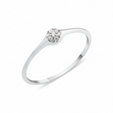 white gold pave cluster ring on white background