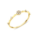 yellow gold floral cluster ring on white background
