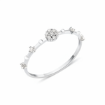 white gold floral cluster ring on white background