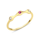 yellow gold fluid swirl ring on white background