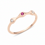 rose gold fluid swirl ring on white background