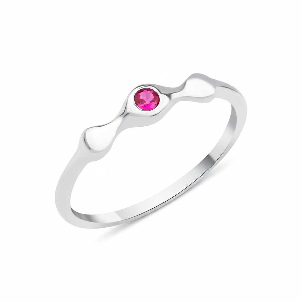 white gold droplet ring on white background