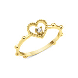 yellow gold open heart ring on white background