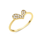 yellow gold tilted heart ring on white background