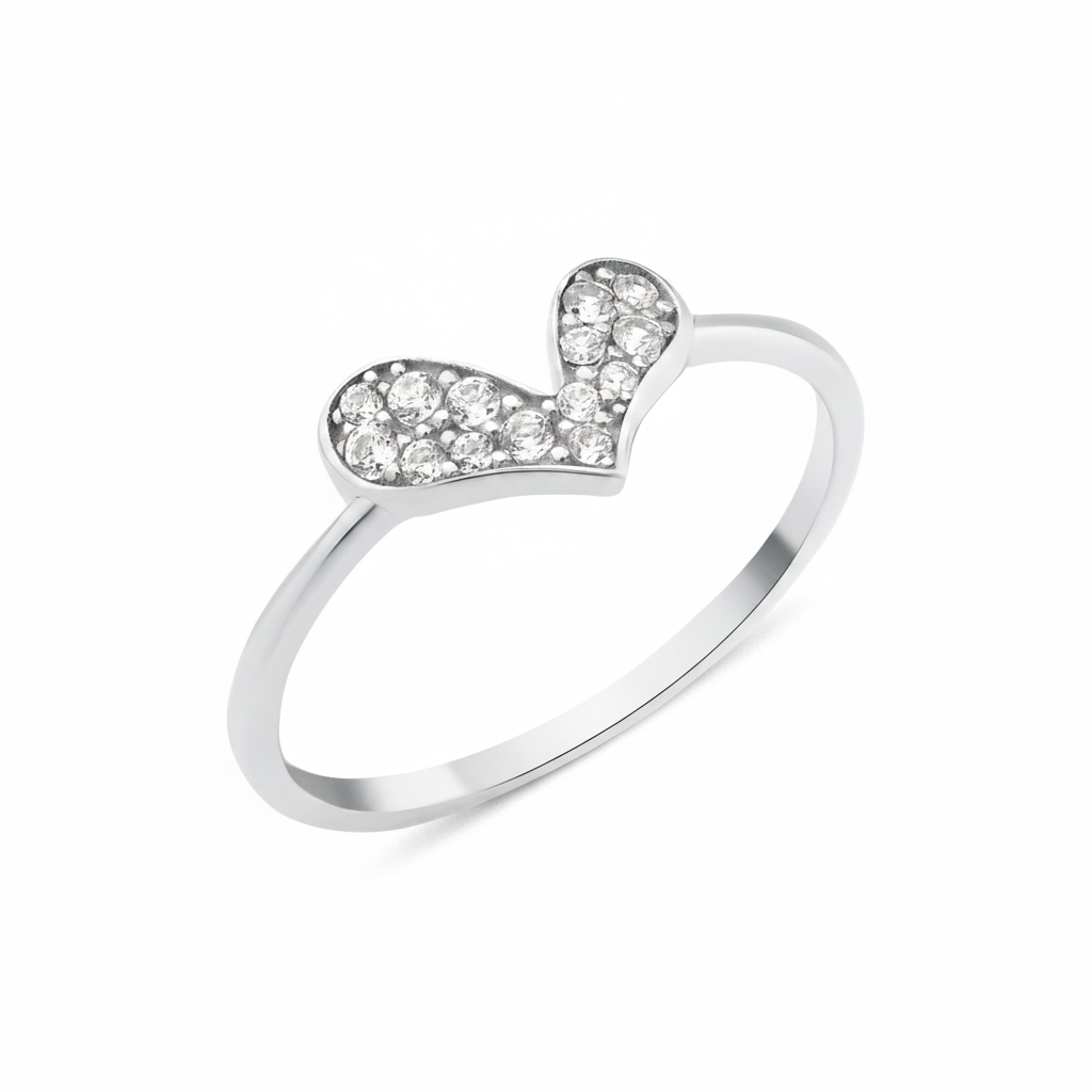 white gold tilted heart ring on white background