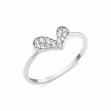 white gold tilted heart ring on white background