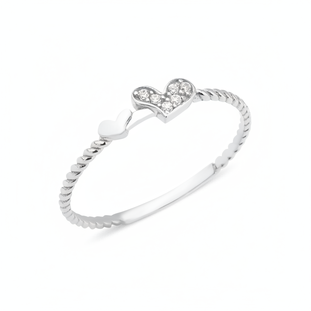 white gold twin heart ring on white background