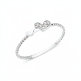 white gold twin heart ring on white background