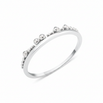 white gold arched crest ring on white background