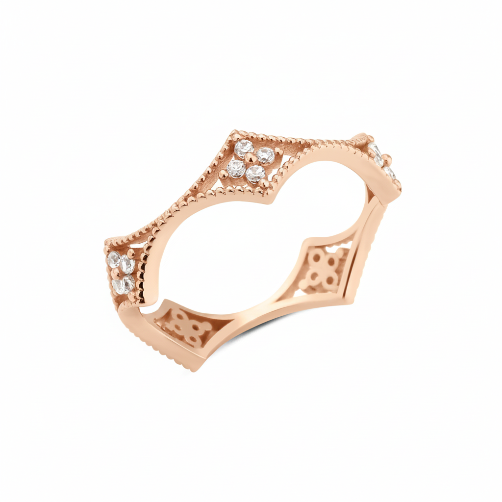 rose gold filigree crown ring on white background