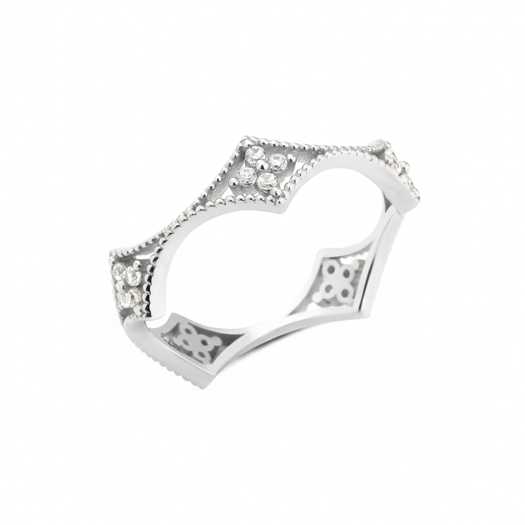 white gold filigree crown ring on white background