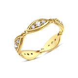 yellow gold wave station ring on white background