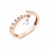 rose gold teardrop bypass ring on white background