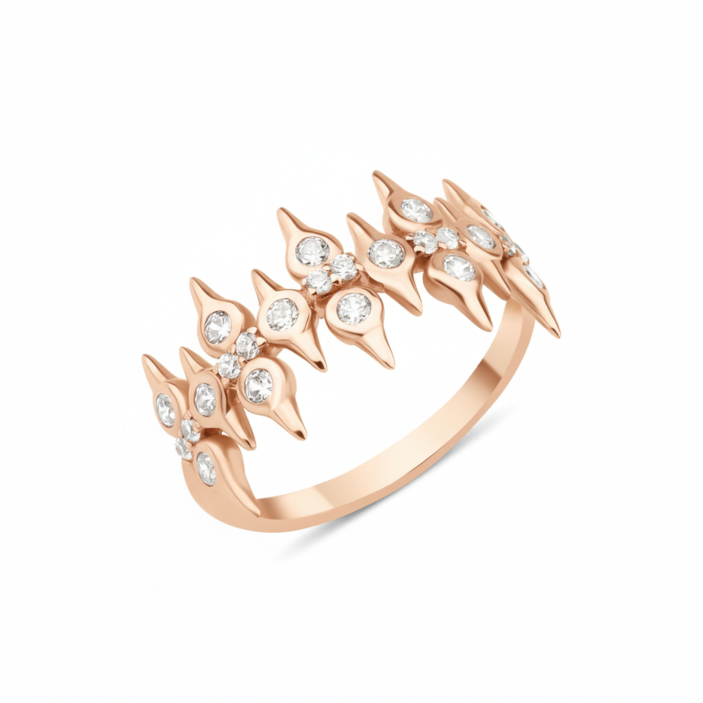 rose gold spire crown ring on white background