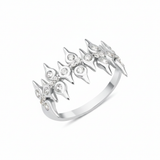 white gold spire crown ring on white background