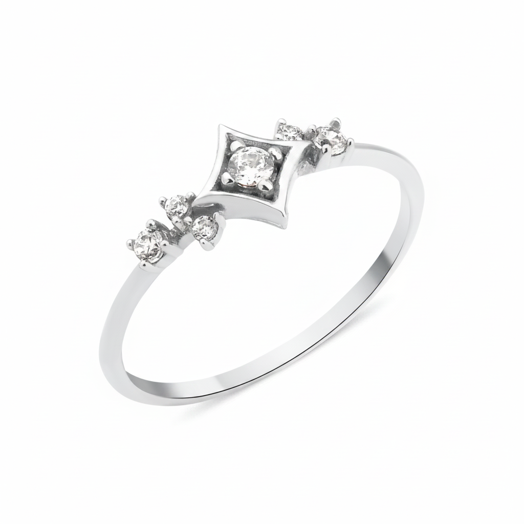 white gold star cluster ring on white background