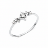 white gold star cluster ring on white background