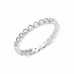 white gold bezel eternity ring on white background