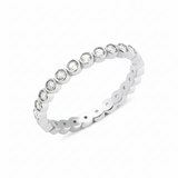 white gold bezel eternity ring on white background
