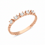 rose gold rope stack ring on white background