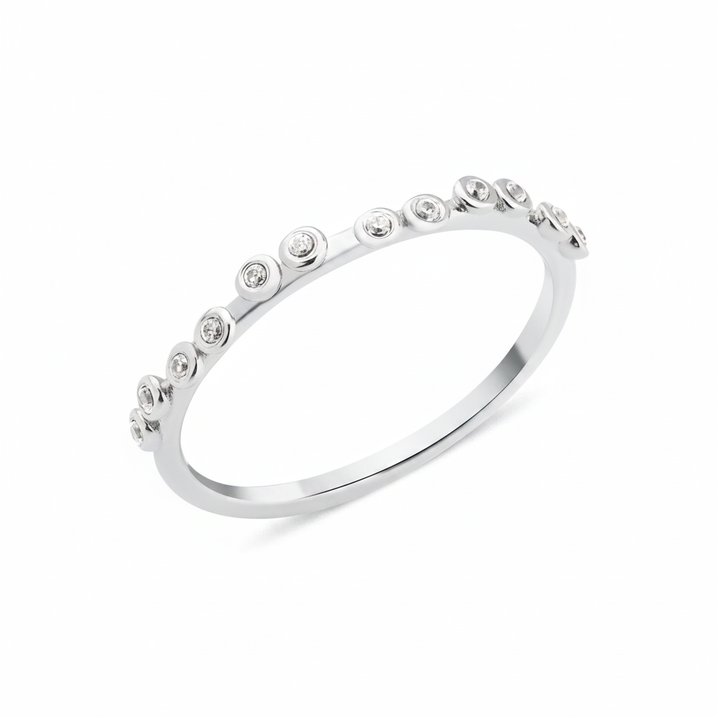 white gold dotted bezel ring on white background