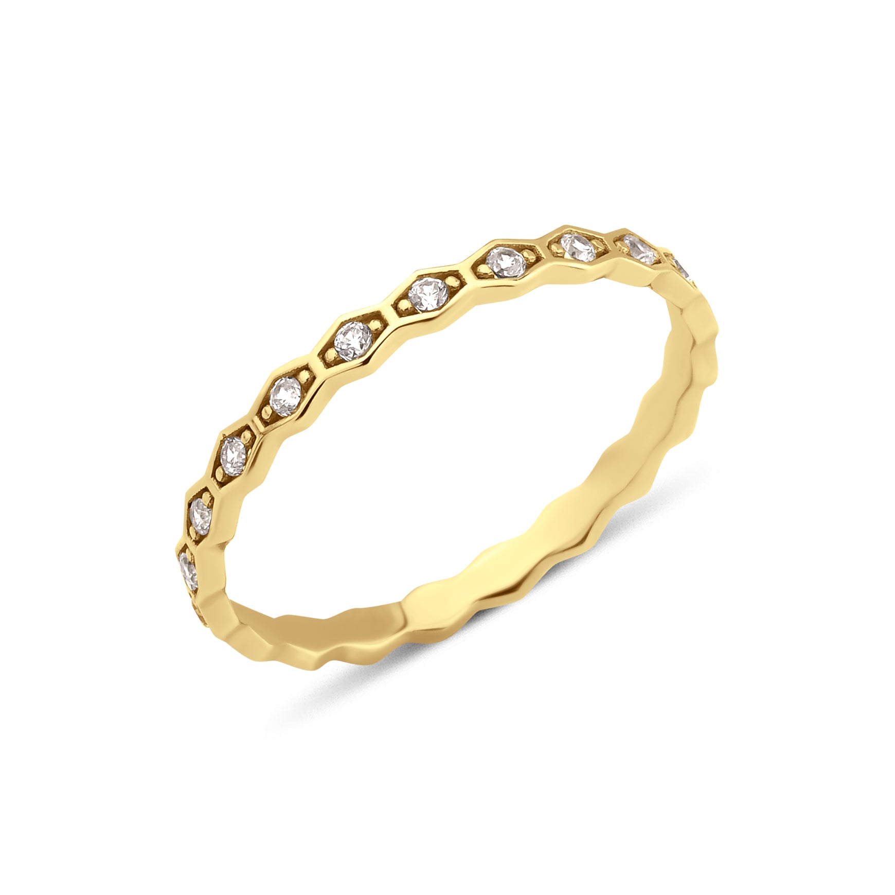 yellow gold hexagon ring on white background