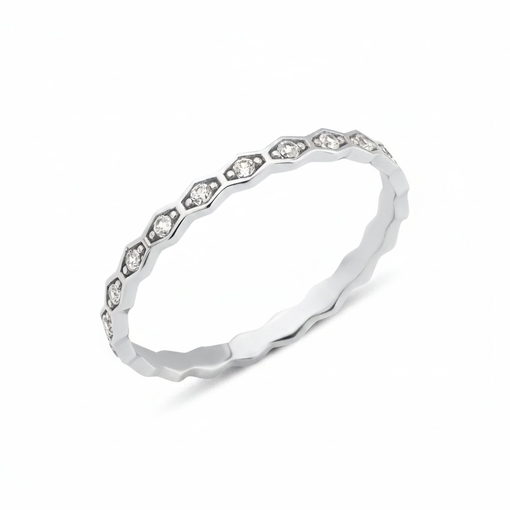 white gold hexagon ring on white background