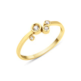 yellow gold asymmetric orbit ring on white background