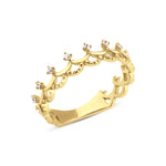 yellow gold tiara ring on white background