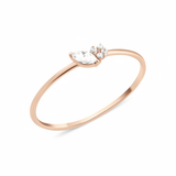 rose gold marquise spark ring on white background