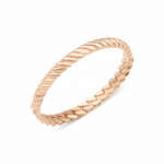rose gold twisted rope ring on white background