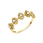 yellow gold ring with beaded marquise stations on white background