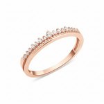 rose gold ring with a crest of pave stones on white background
