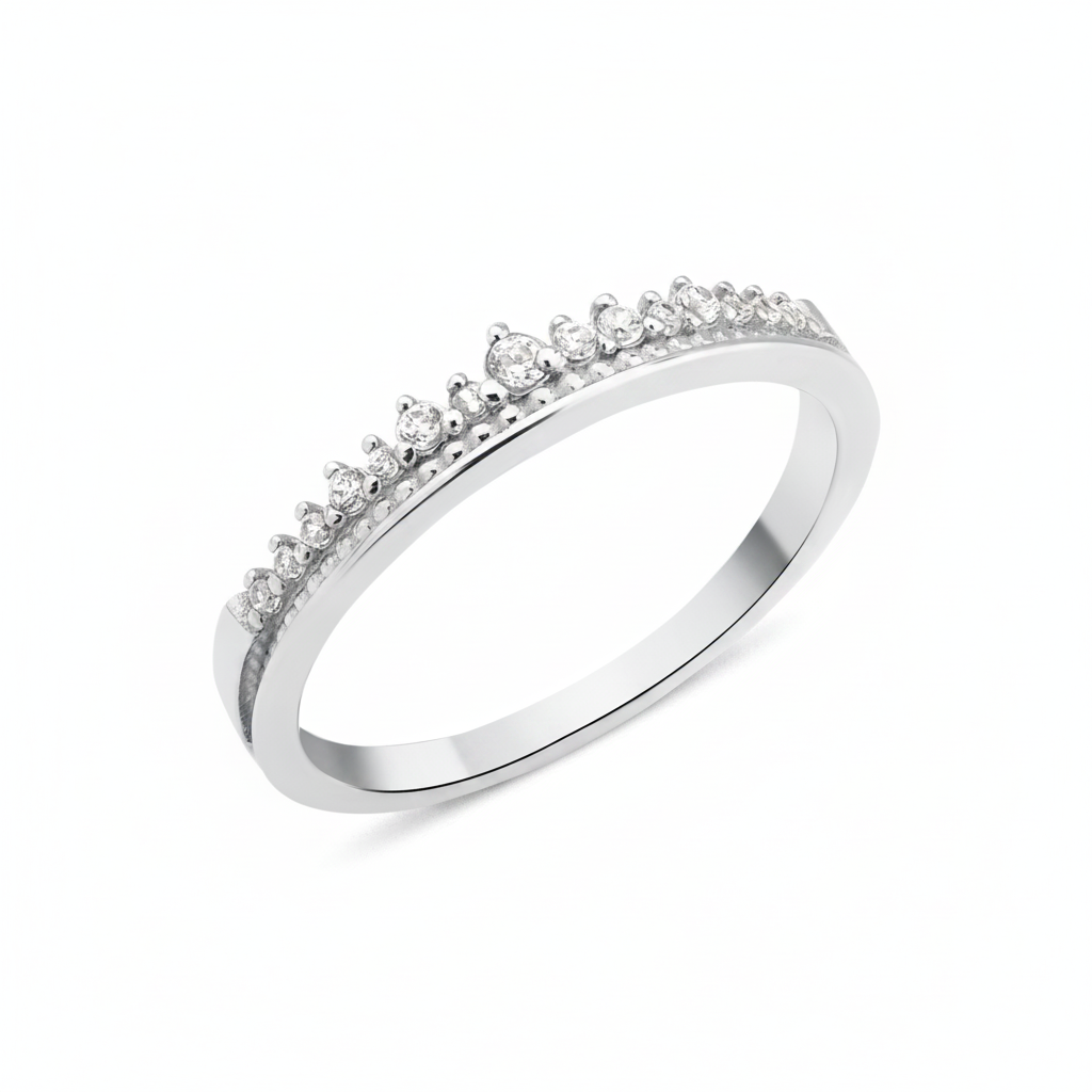 white gold ring with a crest of pave stones on white background