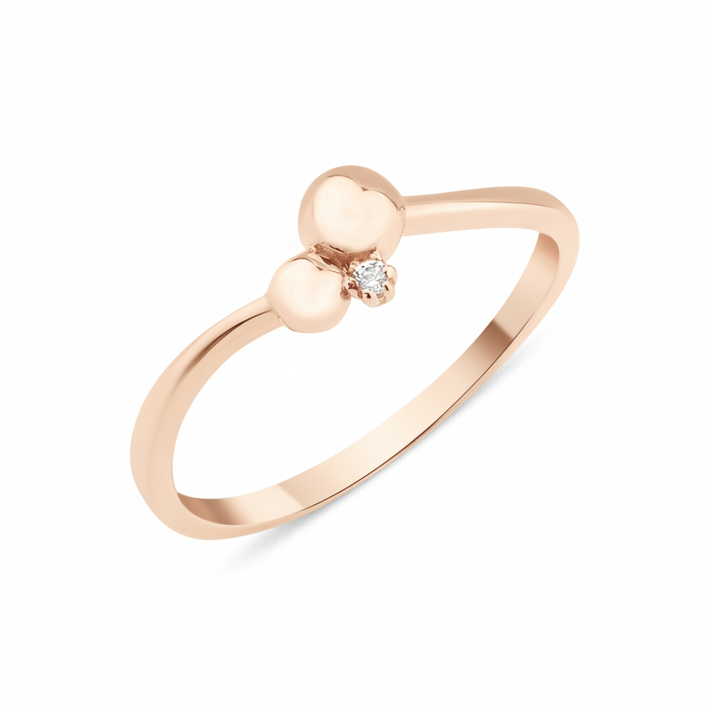 rose gold ring with two polished spheres and a stone accent on white background