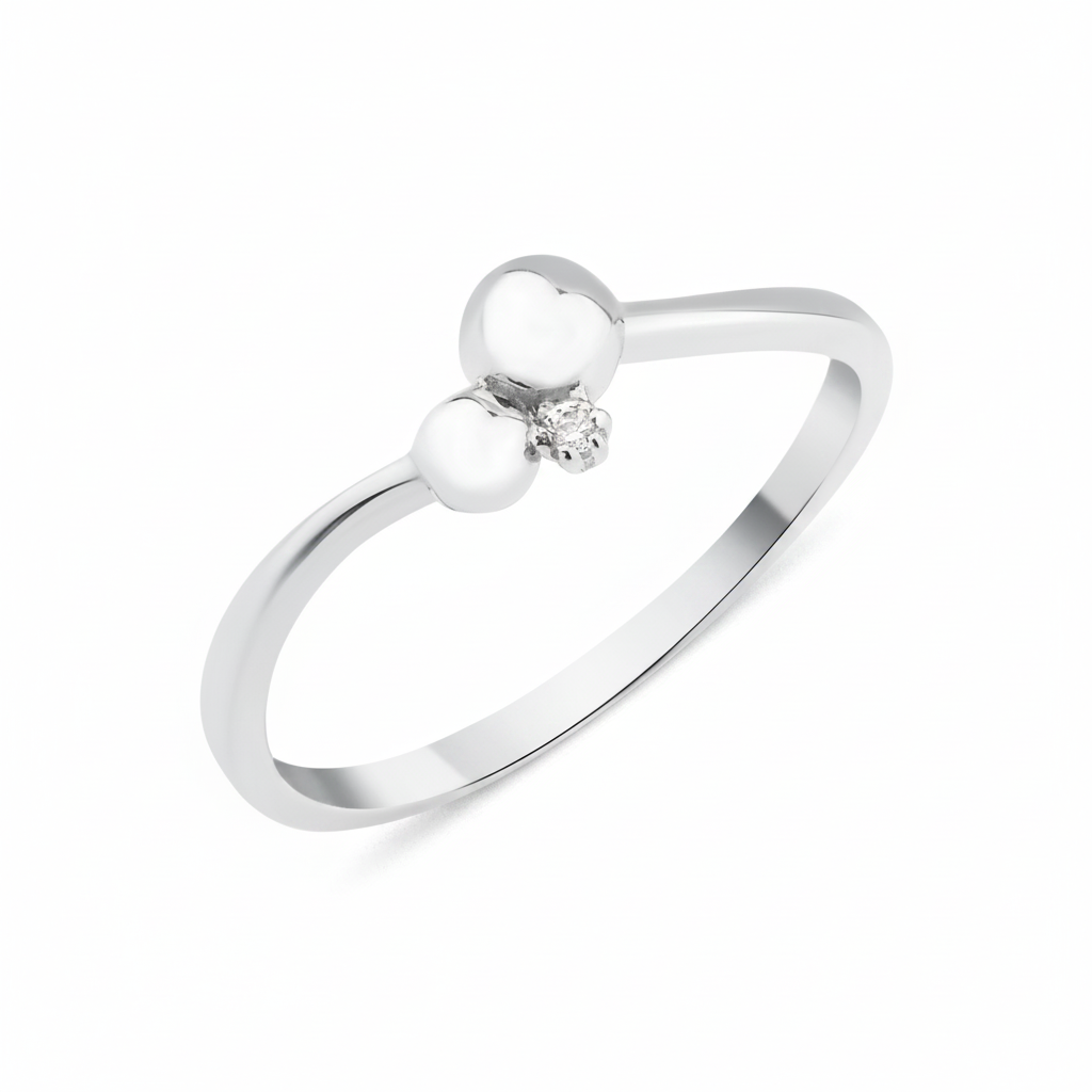 white gold ring with two polished spheres and a stone accent on white background